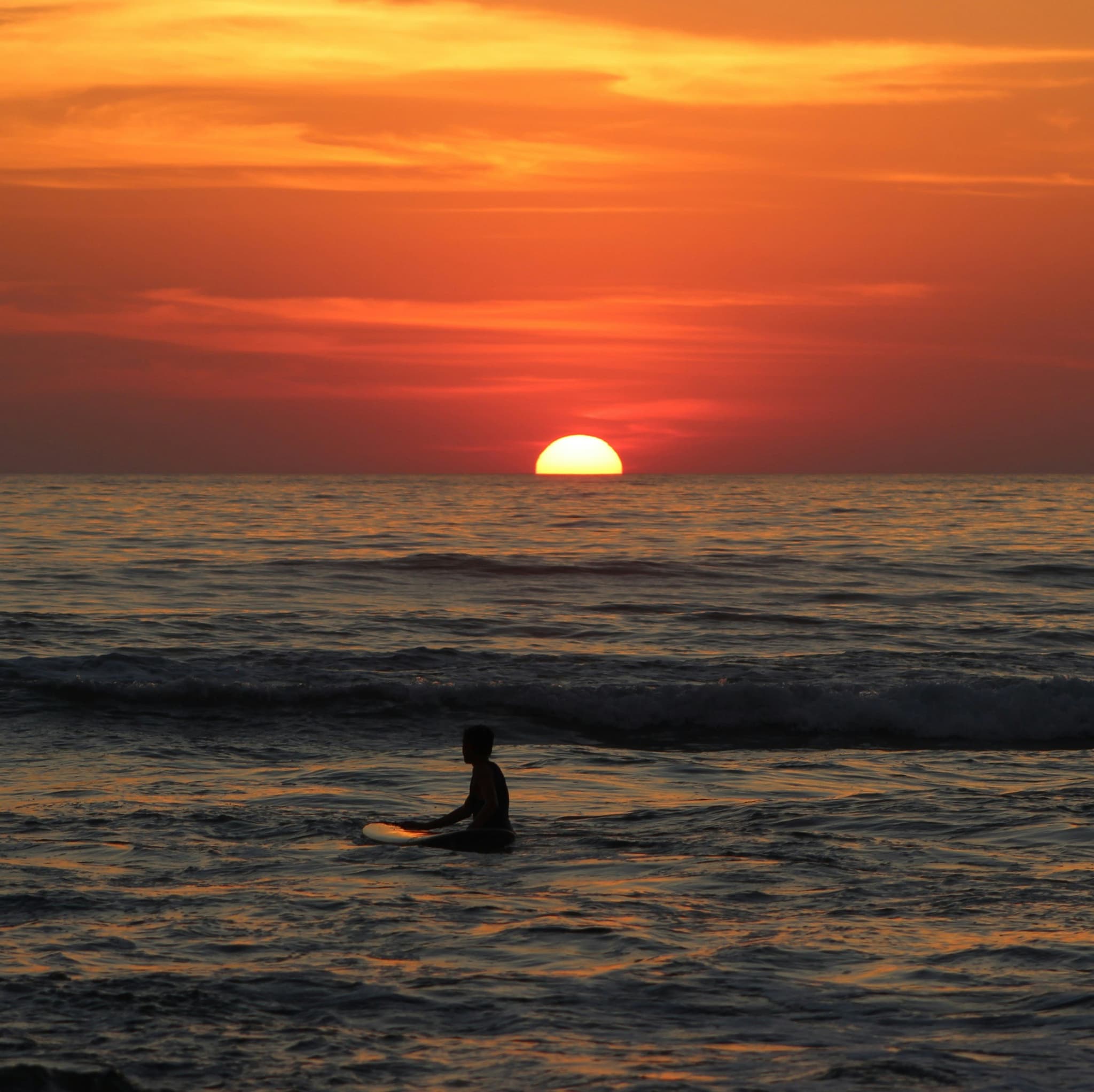 Surfer at sunset